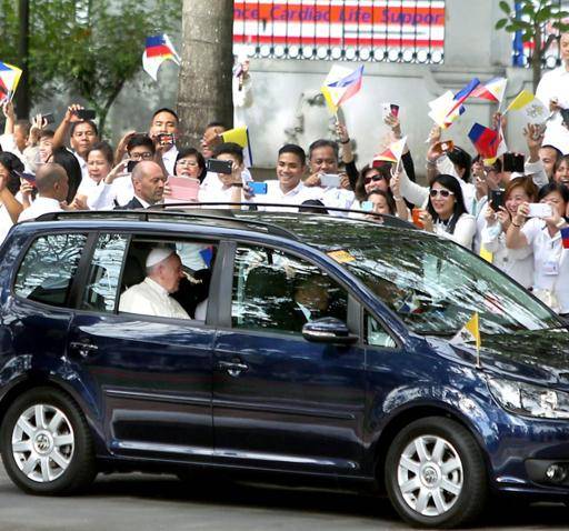 Pope Francis inside a Volkswagen Touran during his visit in the Philippines