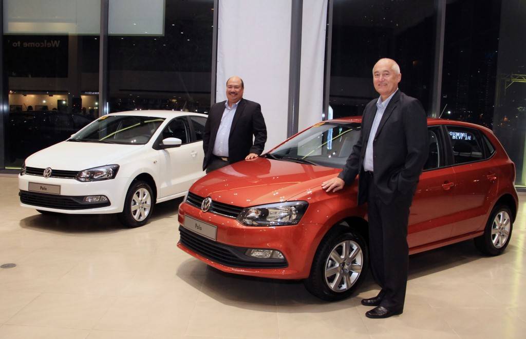 White and red Volkswagen Polo Hatchbacks