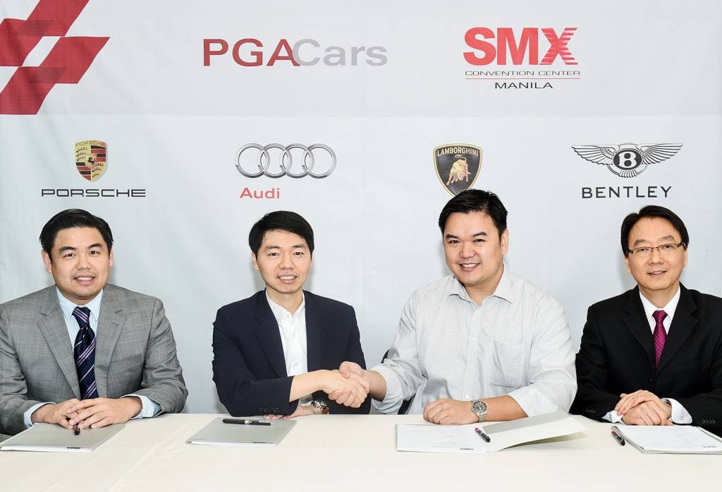 (From left to right) PGA Cars Directors Benedicto Coyiuto and Roberto Coyiuto III, SM Engineering Design & Development Corp. Vice President Hans Sy, Jr. and SMX Vice President Dexter Deyto. 