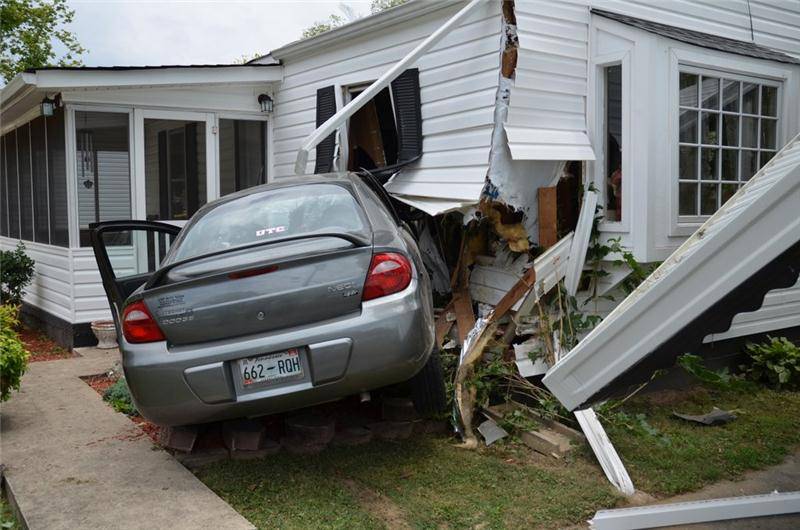 Car crashes into house