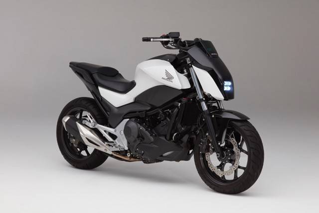 Black and White Honda self-driving motorcycle