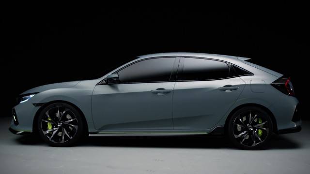 Side view of silver, new honda civic hatchback 2017