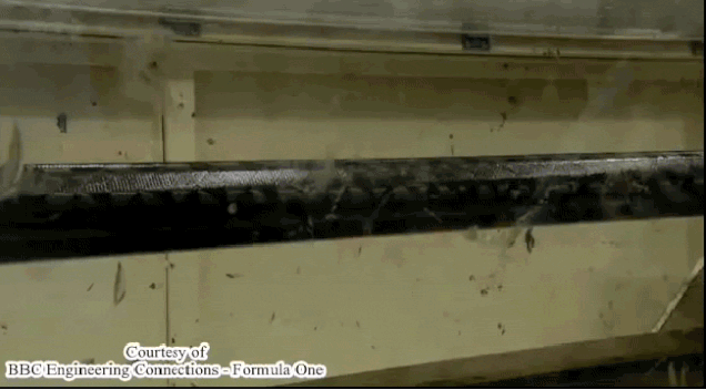 Comparison between a steel and a carbon fiber drive shaft being twisted until they break.