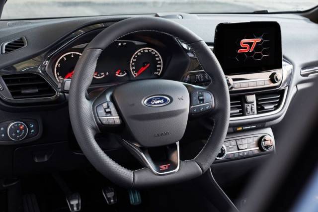 Blue 2018 Ford Fiesta ST steering wheel and dashboard