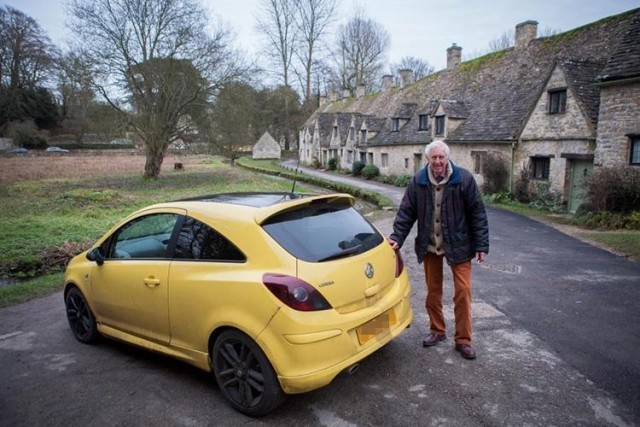 Yellow Vauxhall Corsa with Peter Maddox