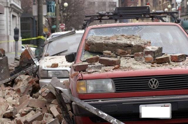 Car with debris from earthquake