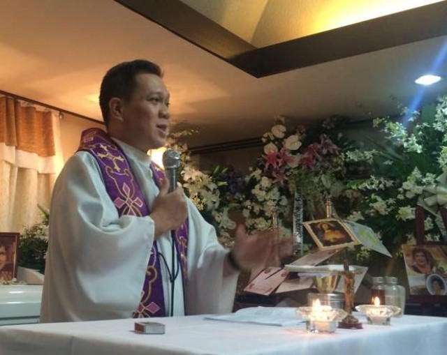 Father Secillano during a homily