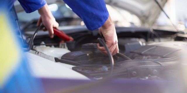 Mechanic checking a car's vitals