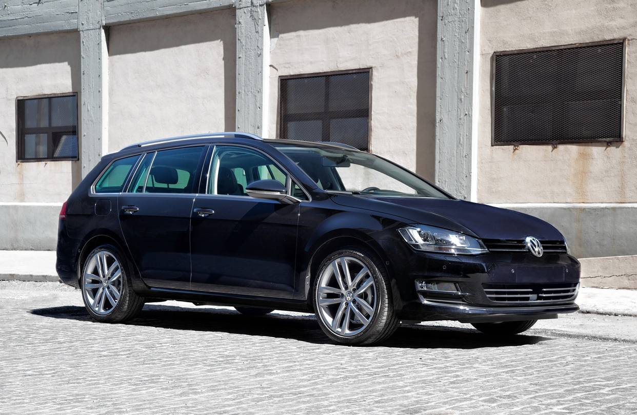 Dark blue chevrolet golf station wagon