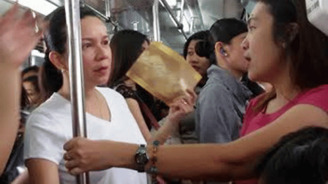 Senator Grace Poe rides the MRT