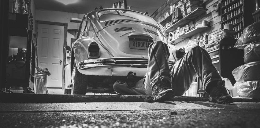 Mechanic working at a car