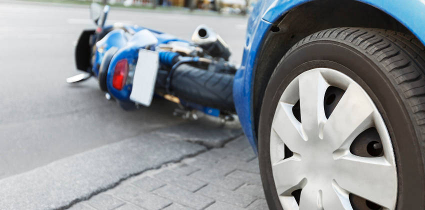 Car hits motorcycle