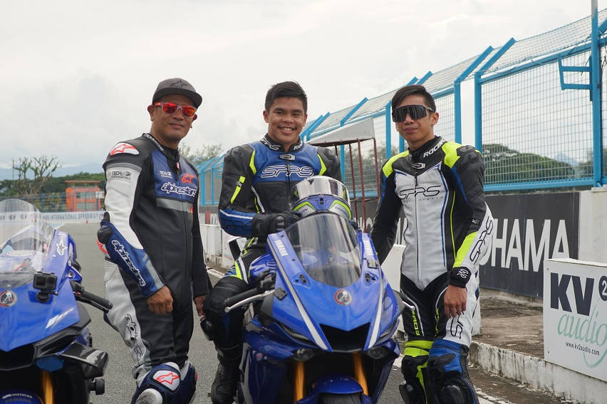 Carlo Paalam taking training lessons unde Joey Storm Rivero with McKinley Kyle Paz 