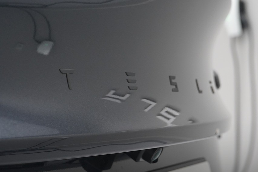tesla model 3 badge