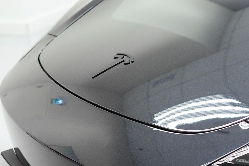 tesla model 3 badge